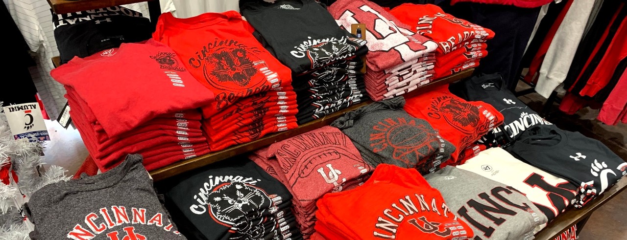 Display of licensed UC t-shirts at a local Rally House store