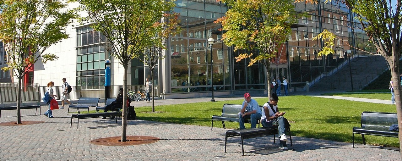 UC Students sitting at University Pavilion