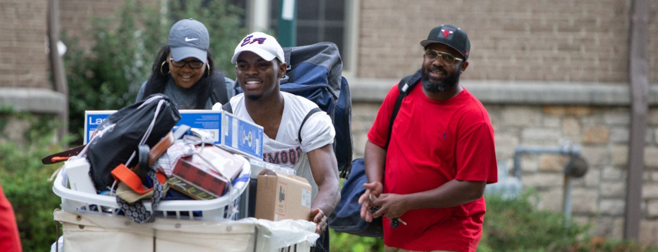Students and their families on residence hall move-in day.