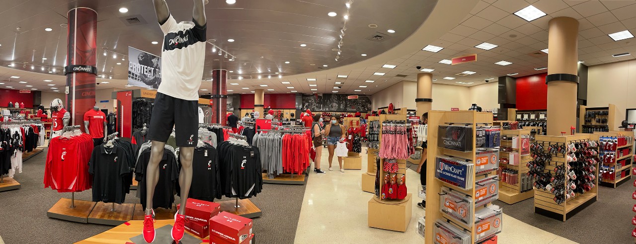 Retail store display featuring University of Cincinnati emblematic merchandise