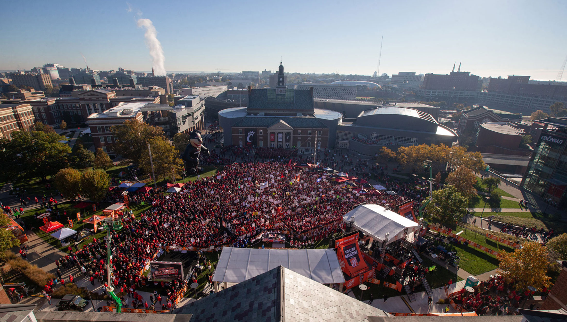 A large crowd gathers in front of UC's Tangeman Univeristy Center before the Homecoming Game