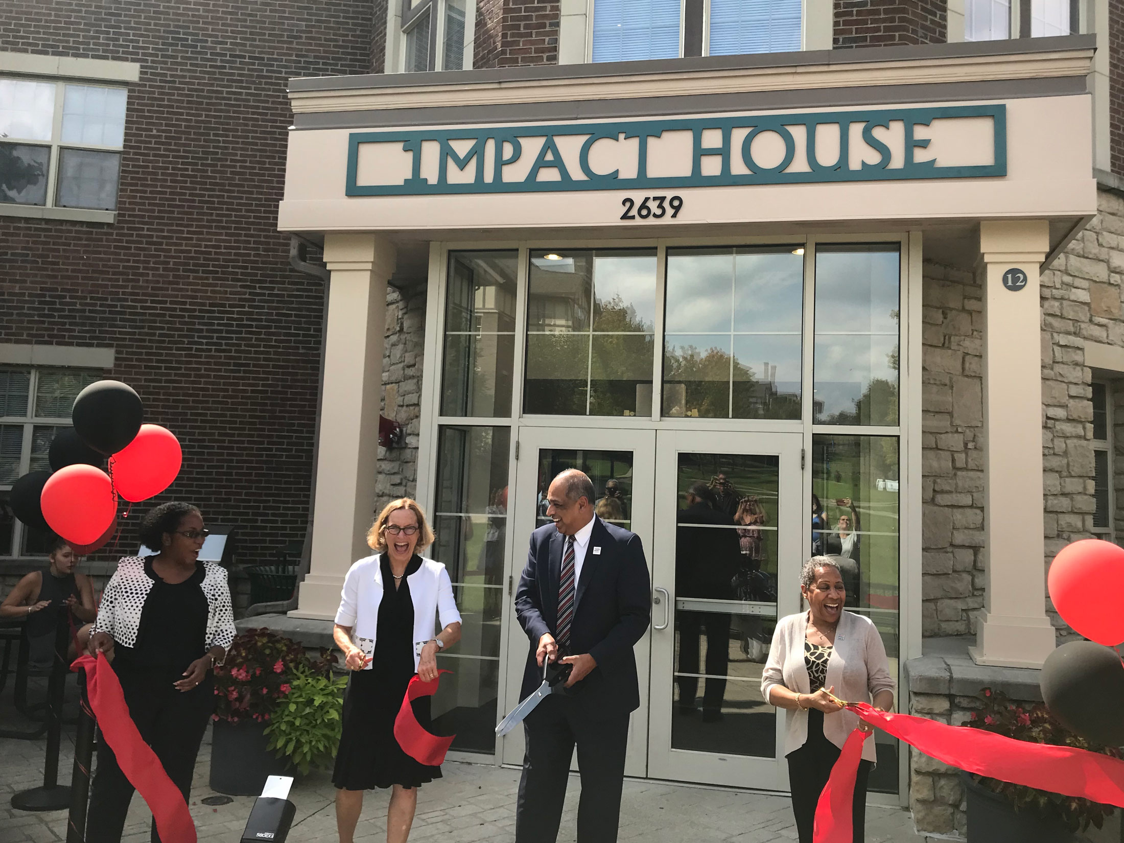 Ribbon cutting ceremony at the University of Cincinnati Impact House