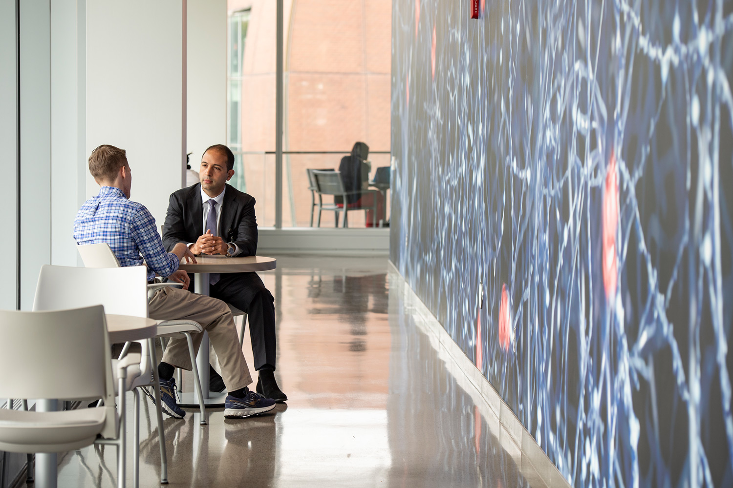 A patient consults with a physician in the Gardner Neuroscience Center