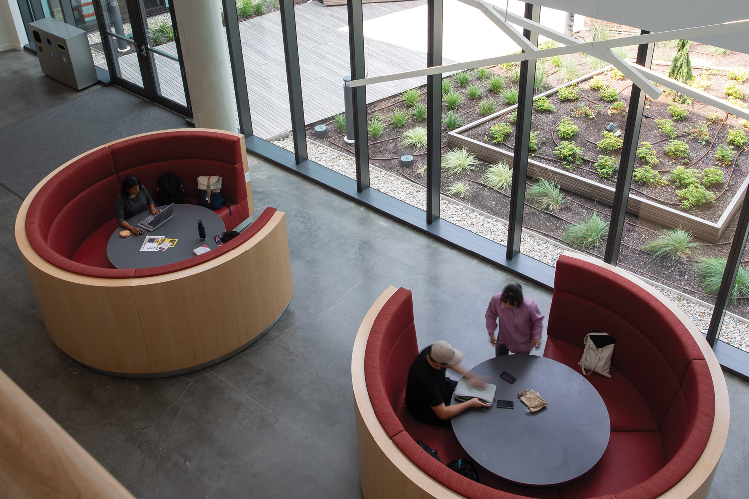 Study pods near a window in the new Lindner College of Business building