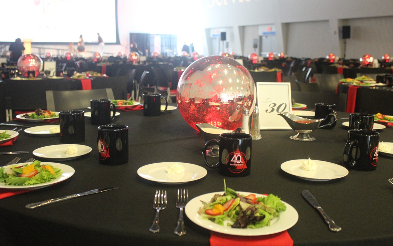 Close up of dinner plates on table with utensils