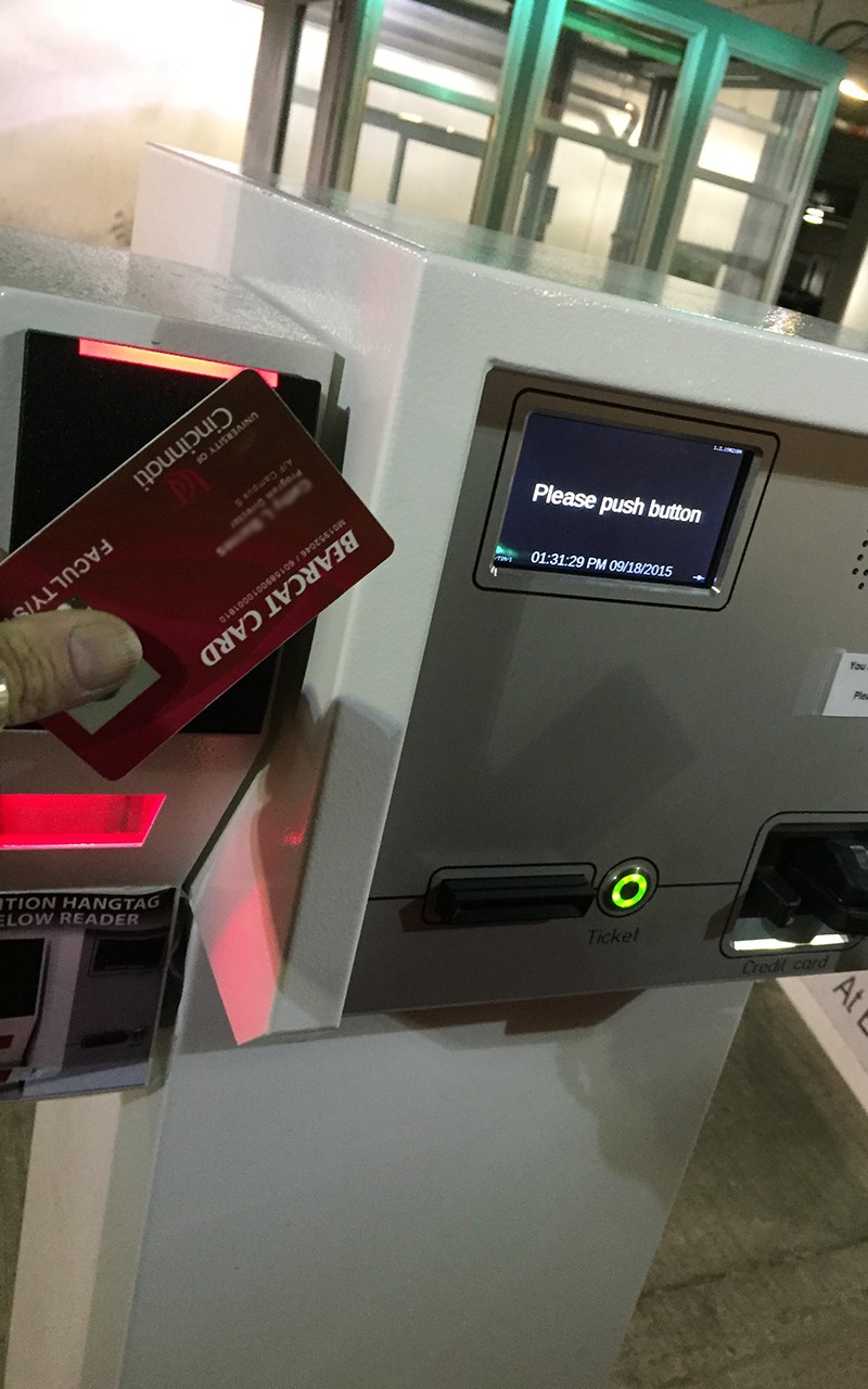 To access garage, UC ID is placed or waved by the black sensor to the left of the entry or exit station.
