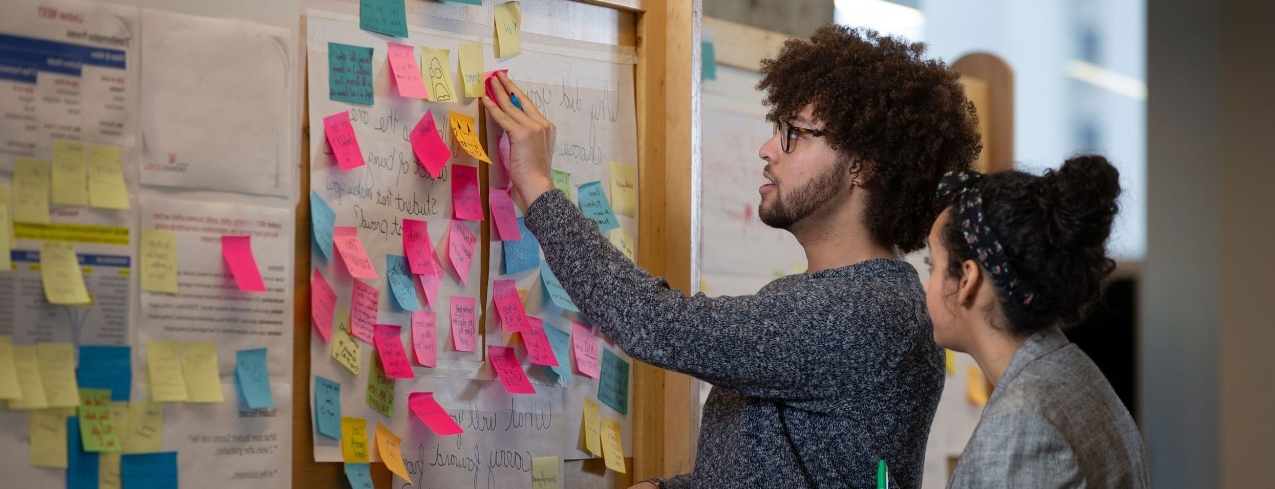 A professor engages in a class discussion