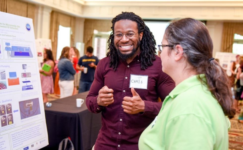 faculty talking to one another 