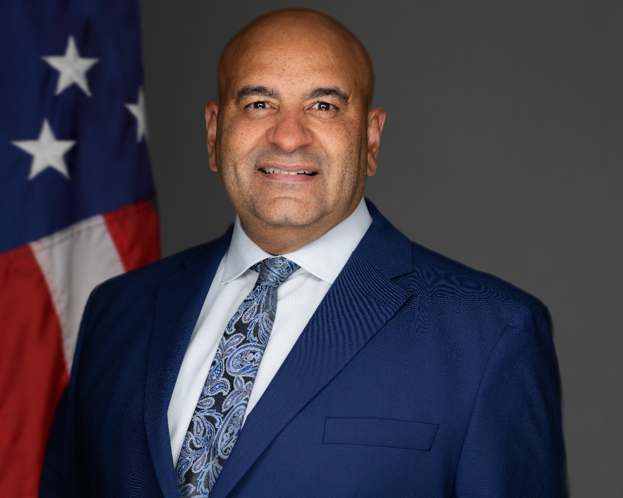 Headshot of John DeJarnette