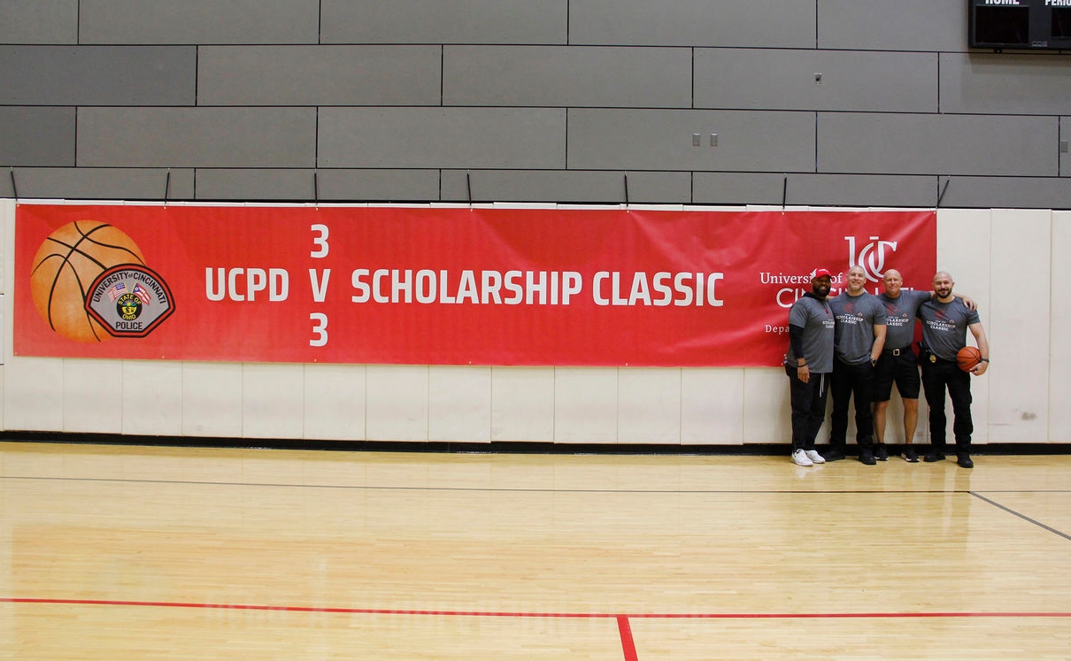 The UCPD Community Engagement Unit poses for a group photo during the UCPD 3v3 Scholarship Classic.