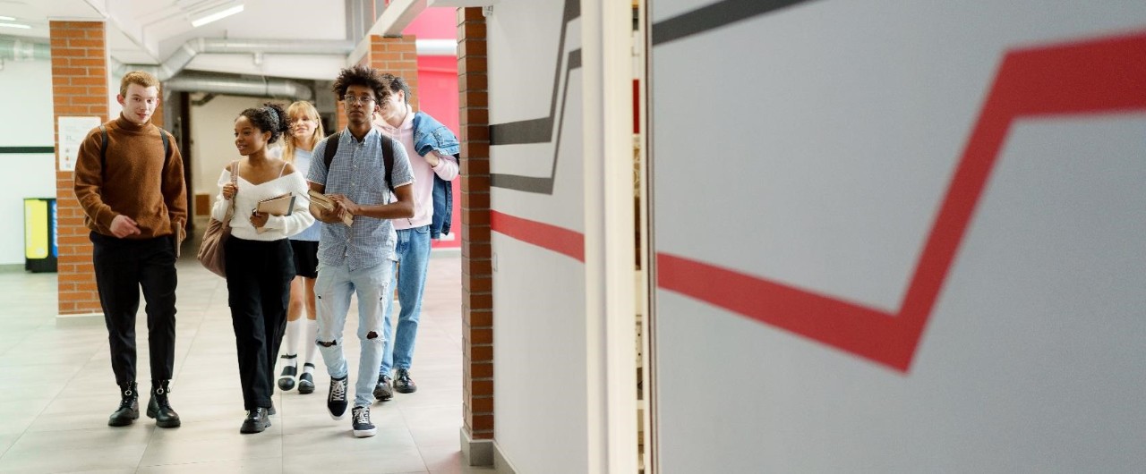 Students walking in a hallway