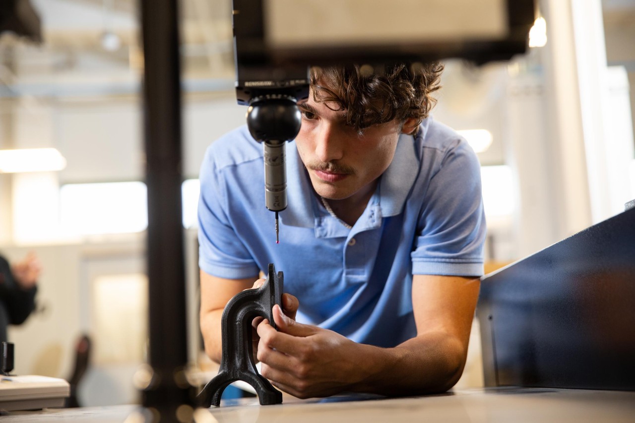 Male co-op student working on Kinetic Vision for real world experience