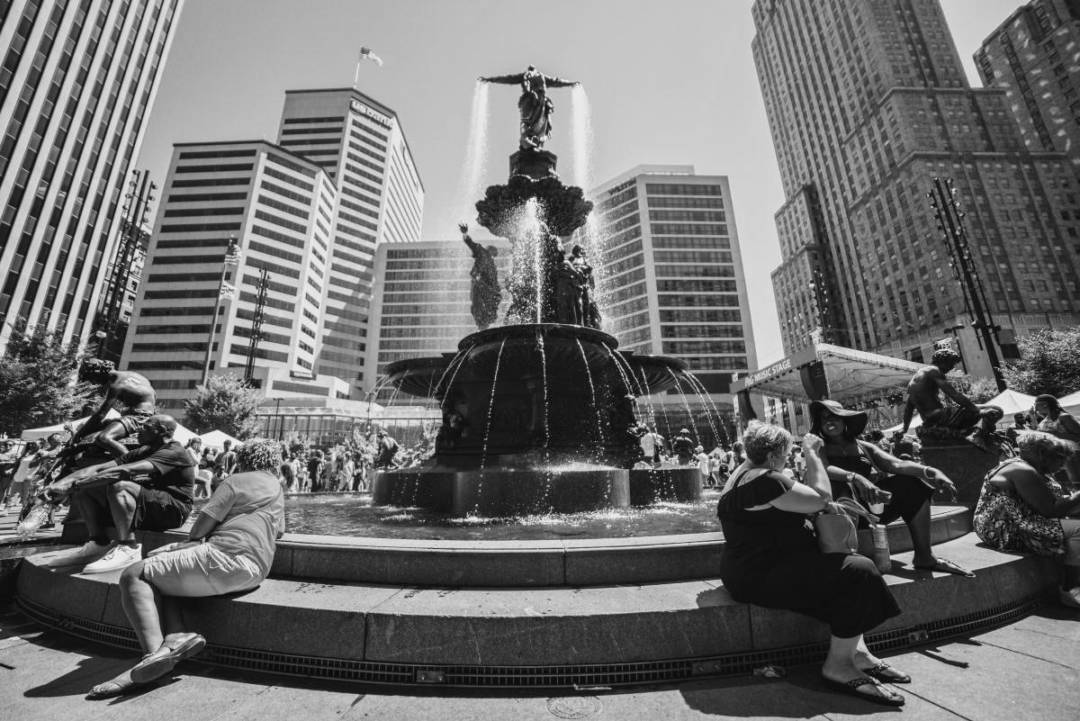 Fountain Square with people sitting around the fountain