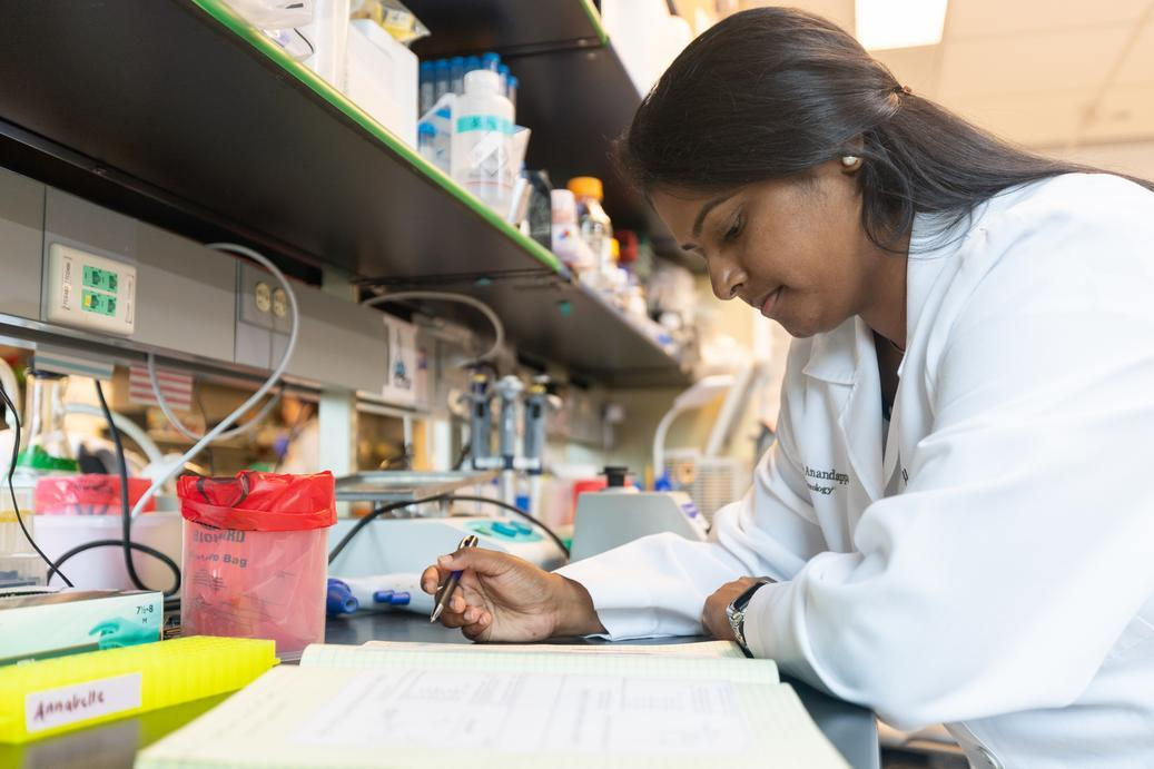 UC physician doing research in a lab at an R1 university