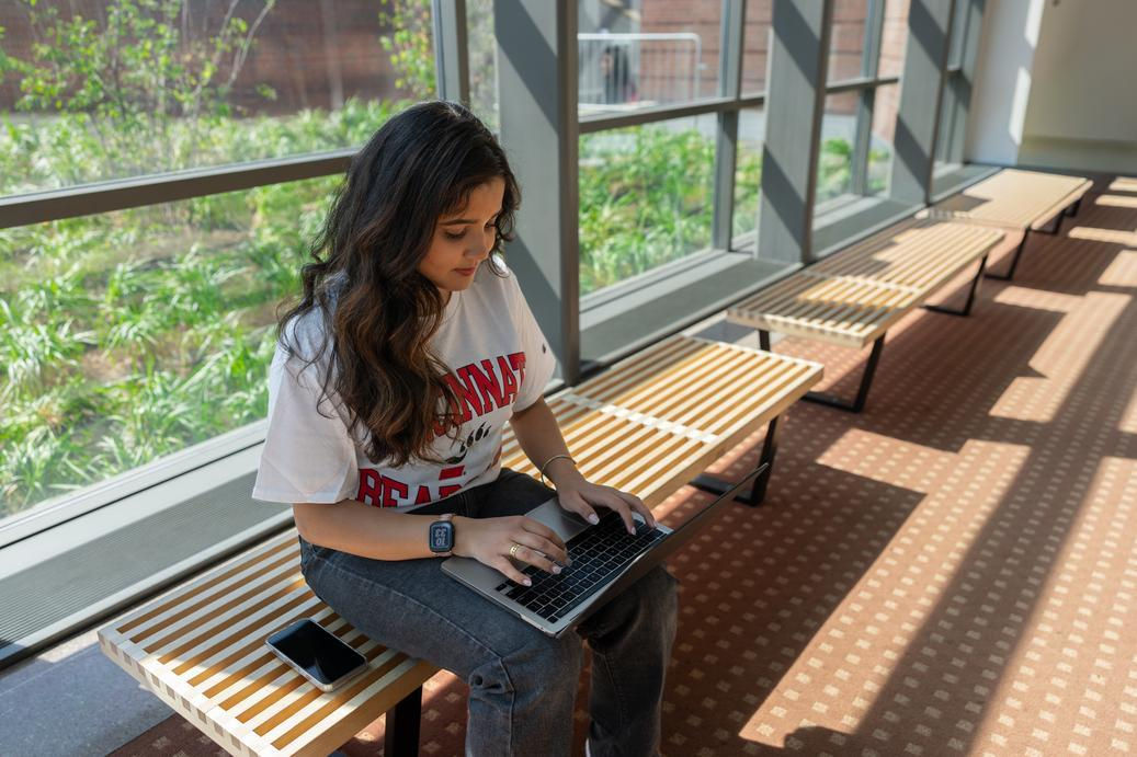 Student on laptop looking up if it's too late to apply to college.