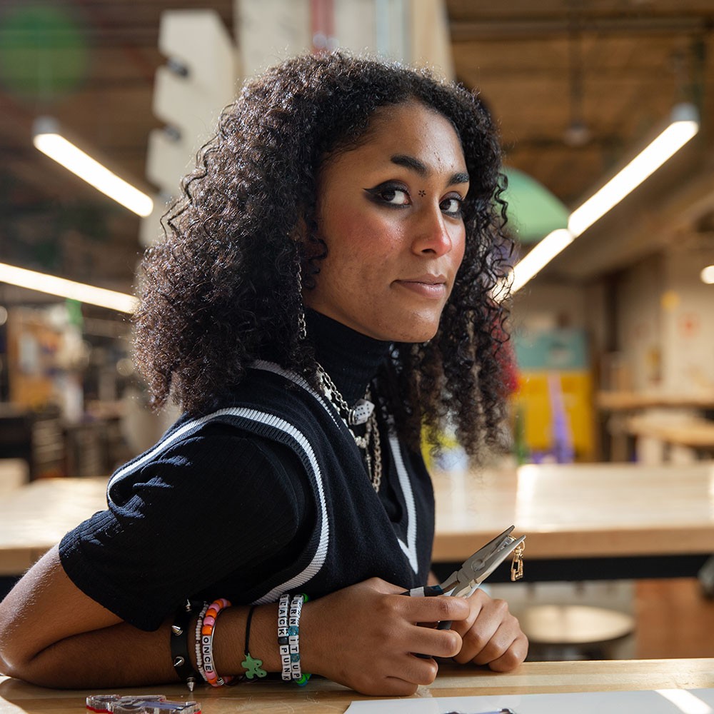 University of Cincinnati Fine Arts student Nukes works in the 1819 Innovation Hub