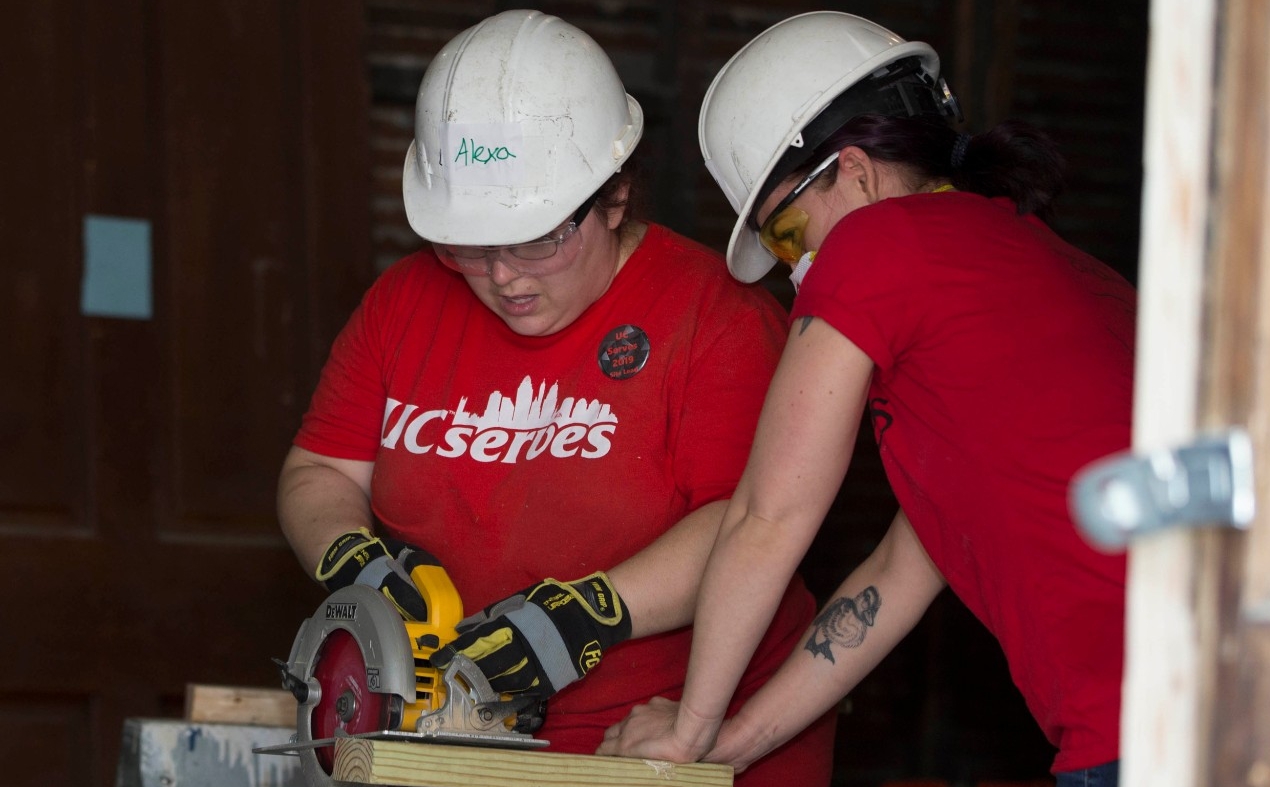 University of Cincinnati faculty and staff members give back to the community through UC Serves 2019 at the Habitat for Humanity Build in Price Hills. UC/Joseph Fuqua II
