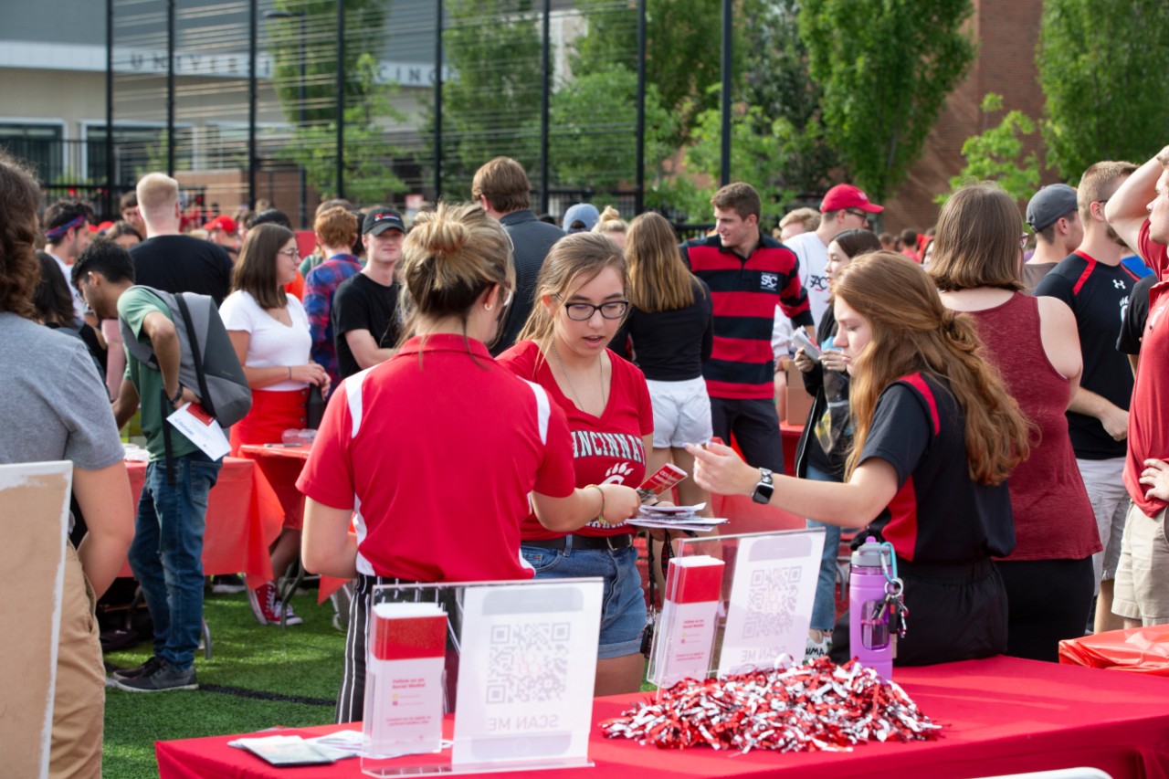 Students talking together at outdoor Organization Fair