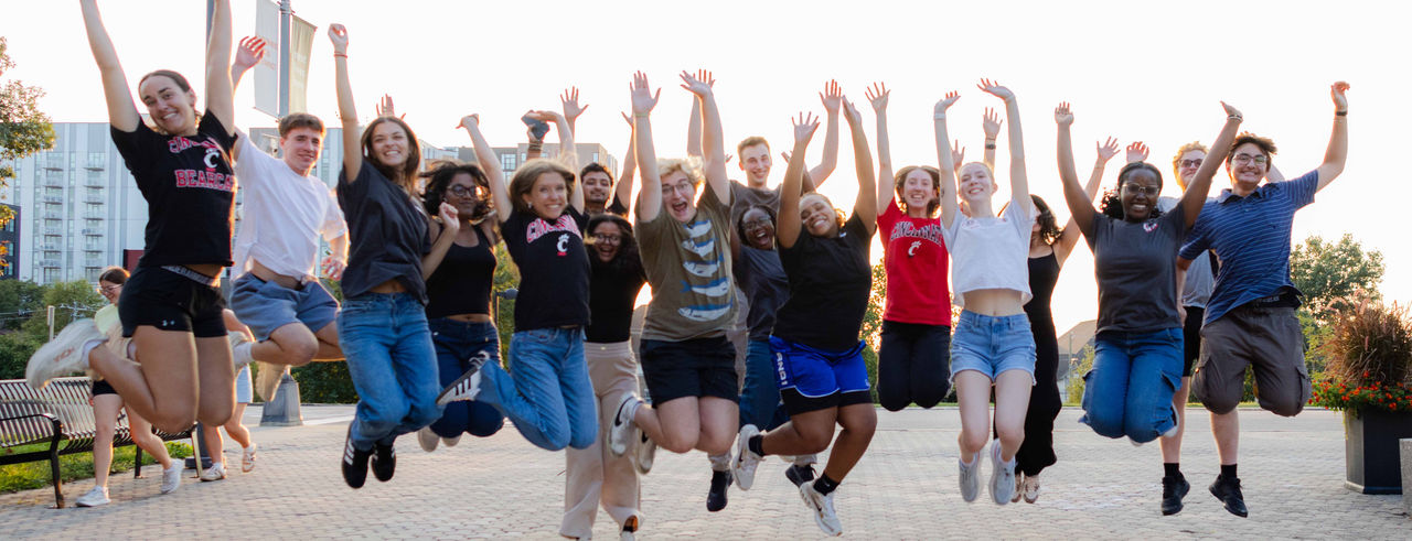 UHP students jumping on campus
