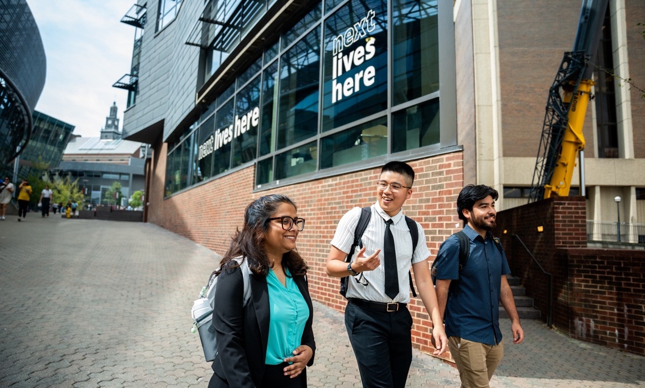 UC Students Walking down Main Street