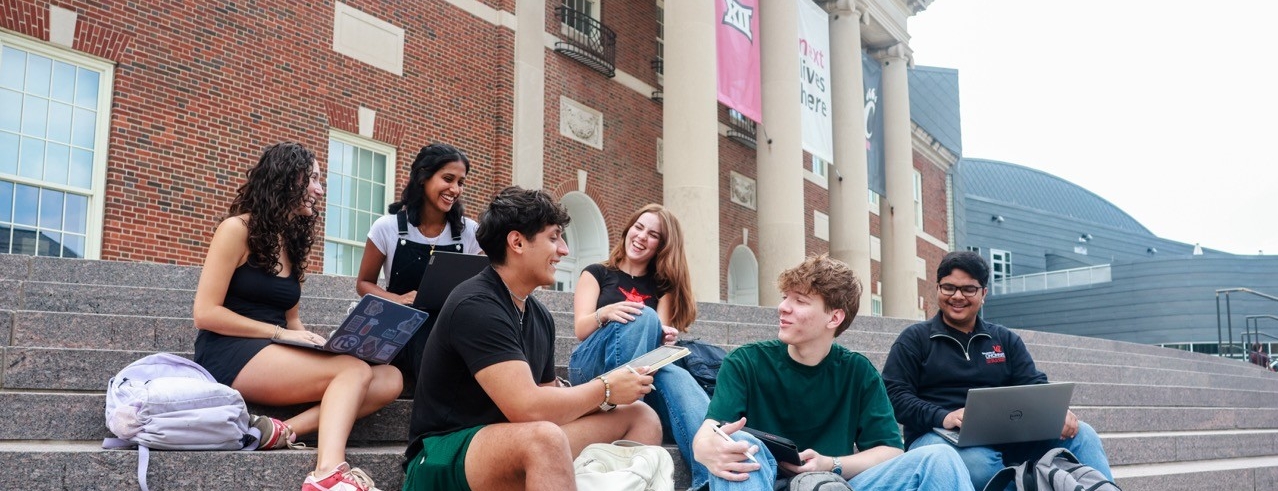 Group of students sitting and studying outside of TUC