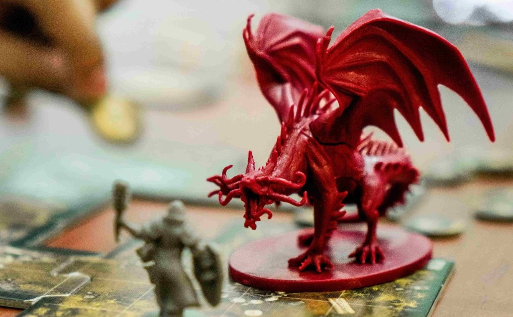 Image of a miniature dragon on a tabletop