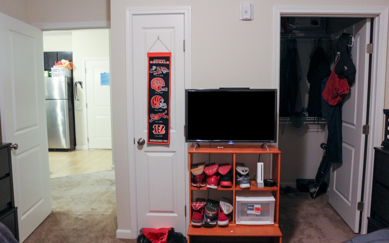 Closet and TV in U Square apartment bedroom