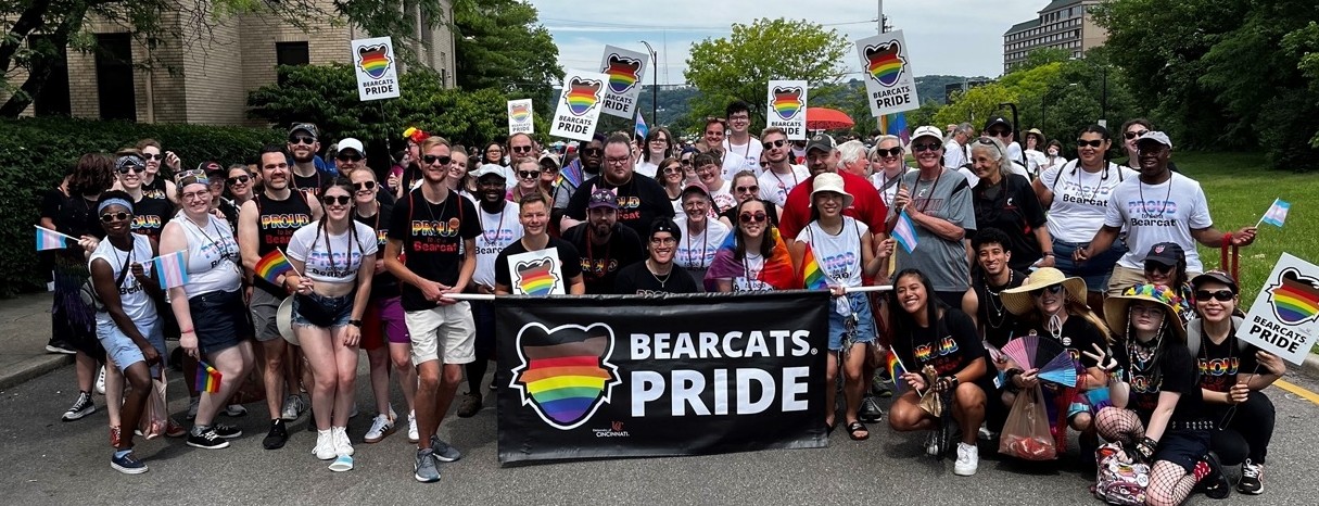 UC community members at Cincinnati Pride 2022 holding a Bearcats Pride banner