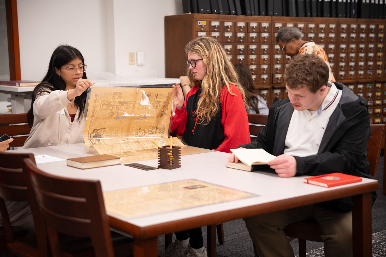 Students researching in archives