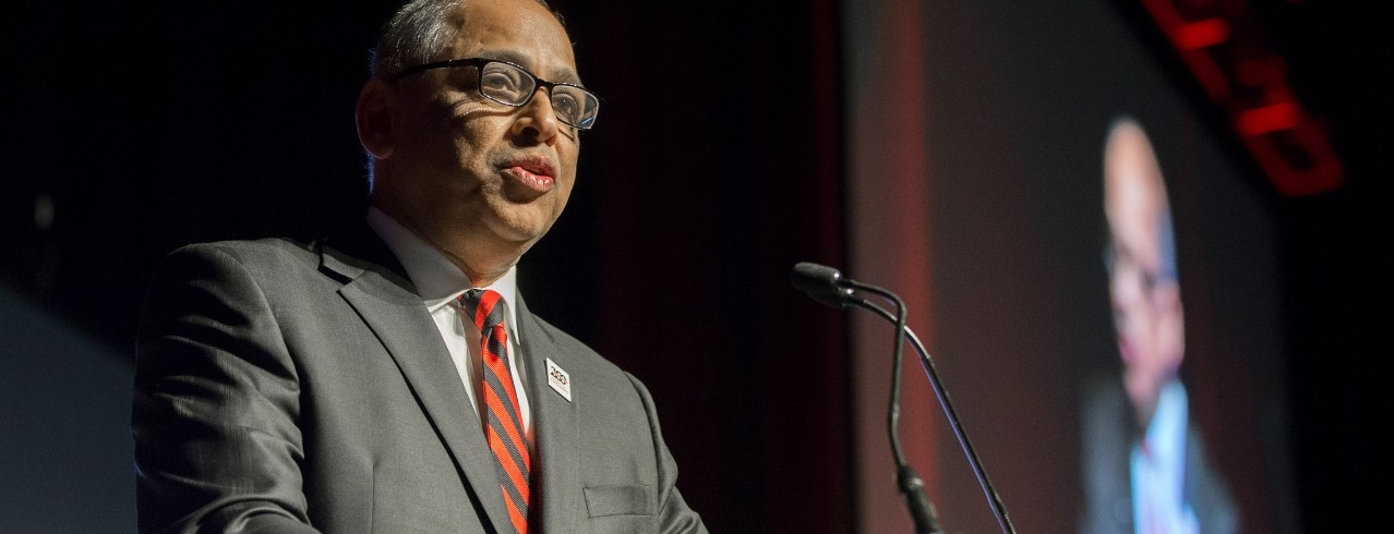 President Pinto at a podium