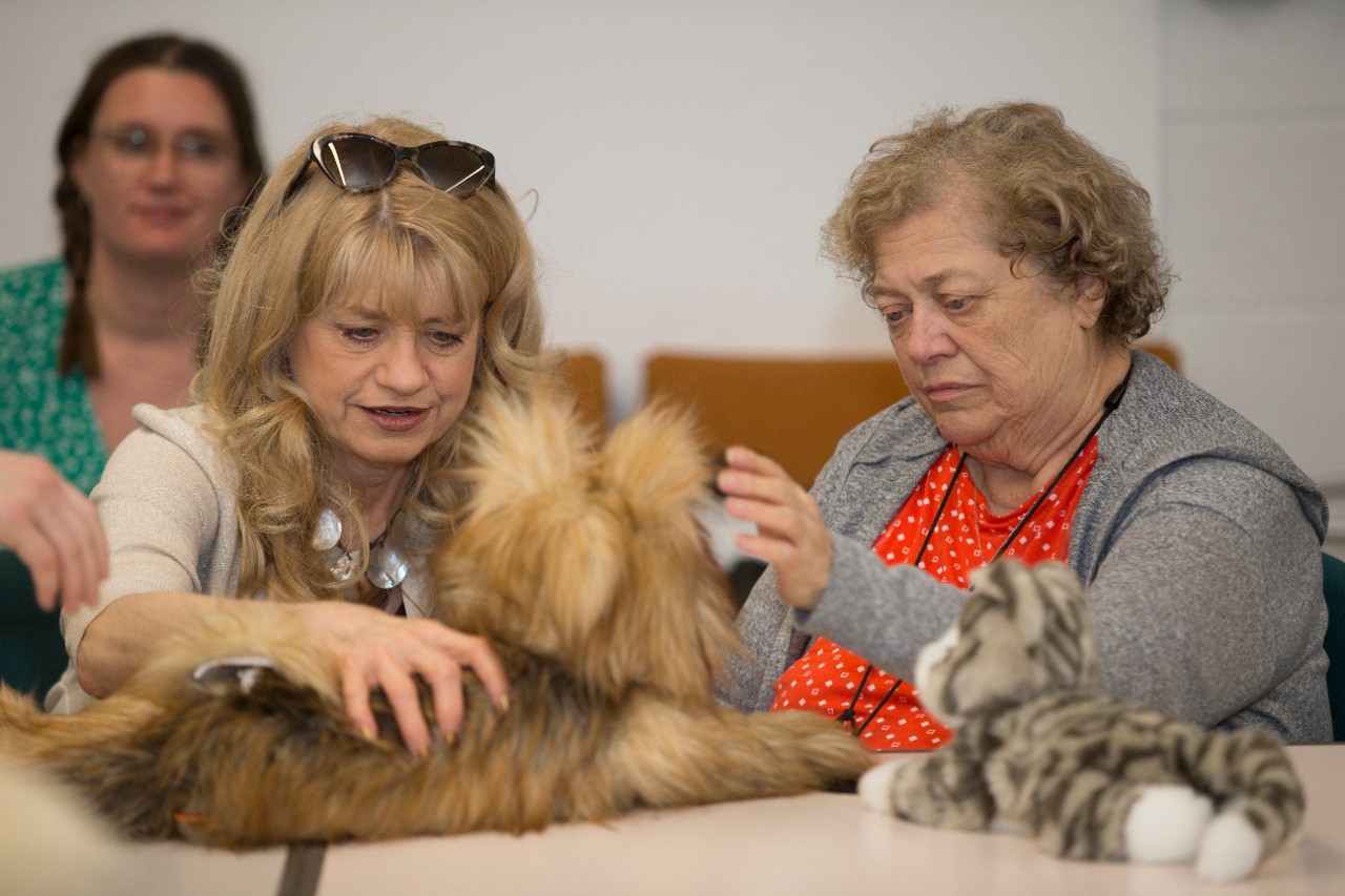 UC professor Claudia Rebola reimagines robotic pets for older populations. Rebola and her graduate student class are redesigning and reimagining robotic pets so that they not only provide companionship, but care.