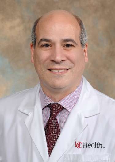 headshot of Dr. Charles Prestigiacomo, a neurosurgeon