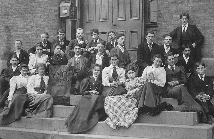 1800s students sitting on steps