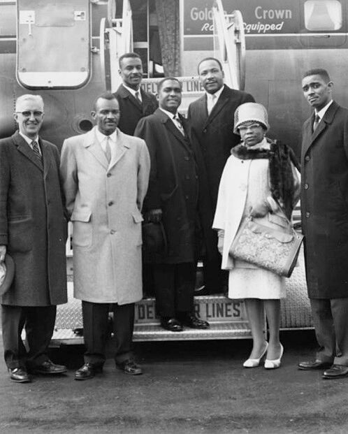 Black and white photo of a group of people including Venchael Booth and Martin Luther King, Jr.