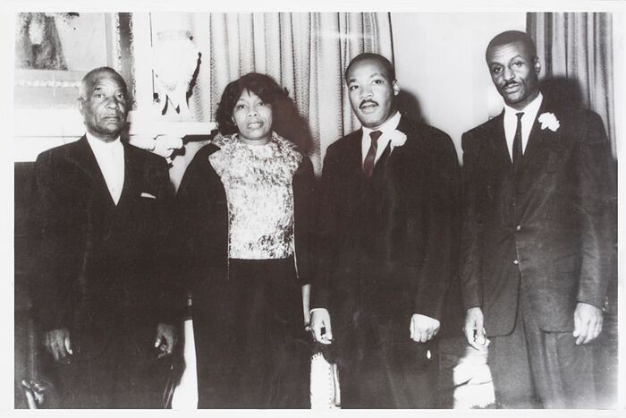 Black and white photo of Robert Shropshire, Sr.; Louise Shropshire; the Rev. Martin Luther King, Jr.; and the Rev. Fred Shuttlesworth, Sr.