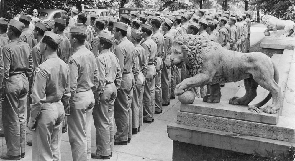 WWII soldiers lined up in front of McMicken Hall