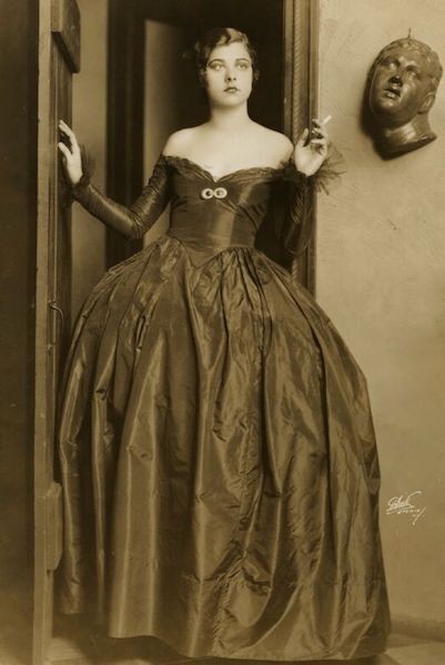 Black and white photo of Libby Holman in a gown
