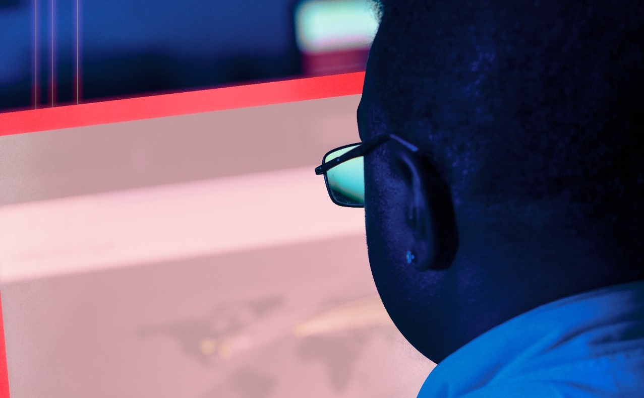 Close up of hands on computer keyboard, stylized to illustrate cyber security for a UC Magazine feature on the Cyber Range.