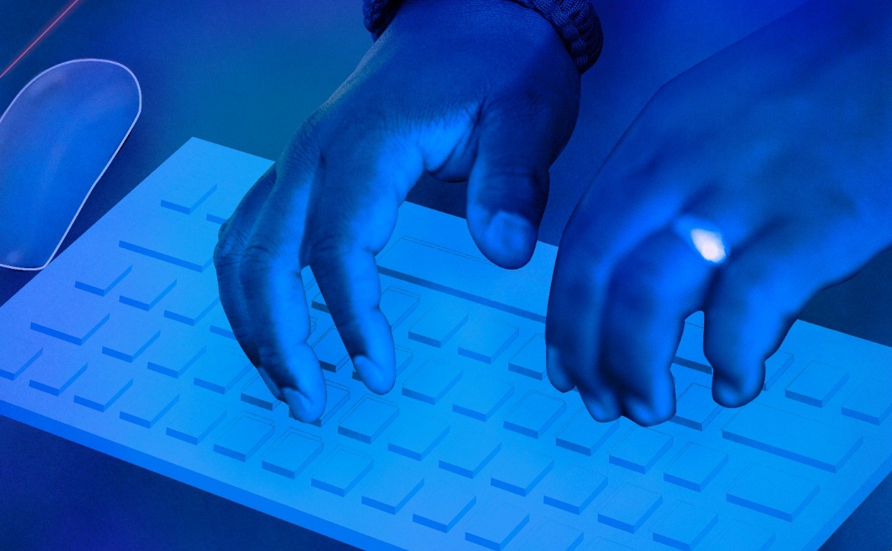 Close up of hands on computer keyboard, stylized to illustrate cyber security for a UC Magazine feature on the Cyber Range.