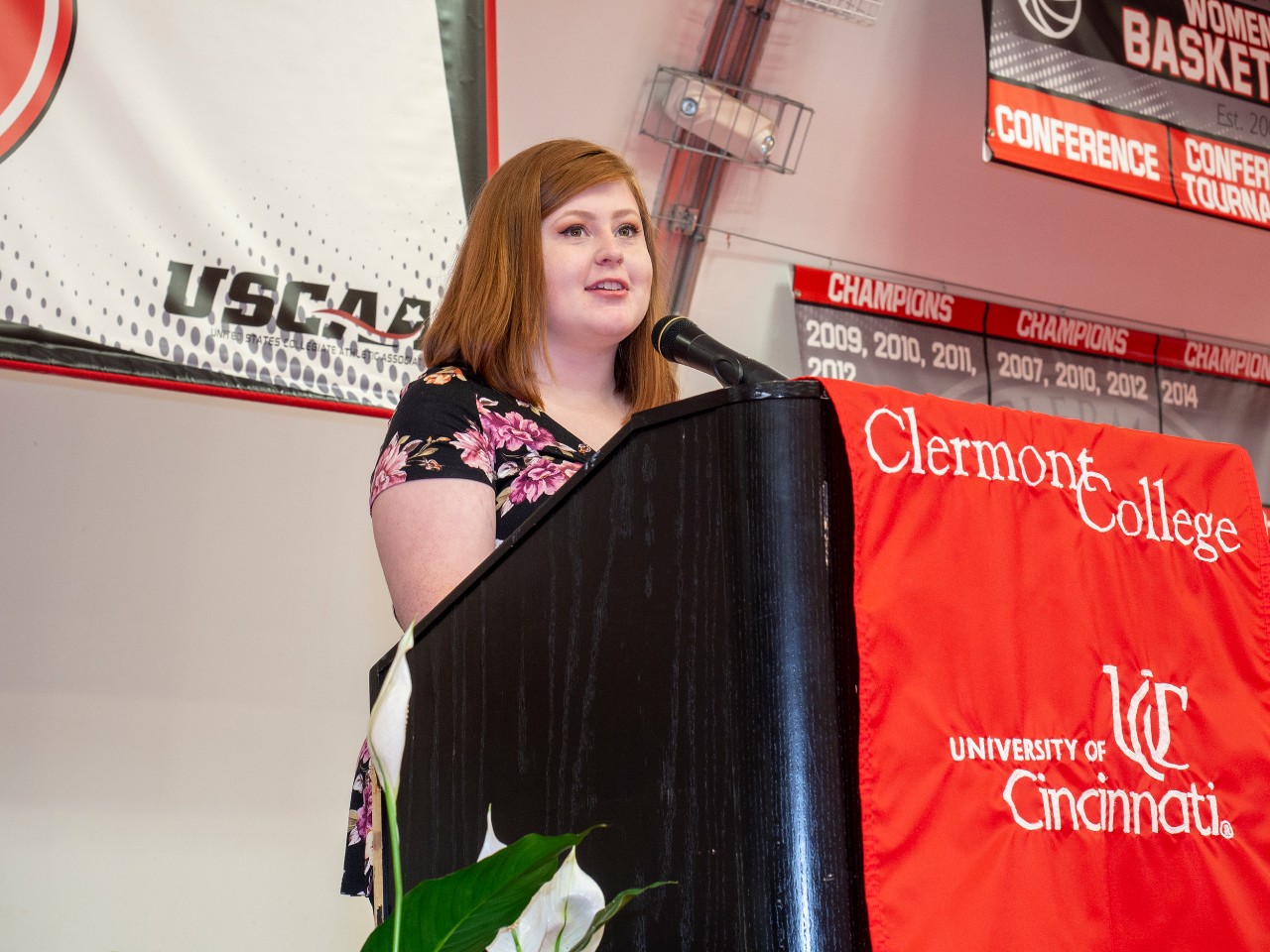 Scholarship recipient Liz Adams sepaks at Community Partnership Luncheon. 