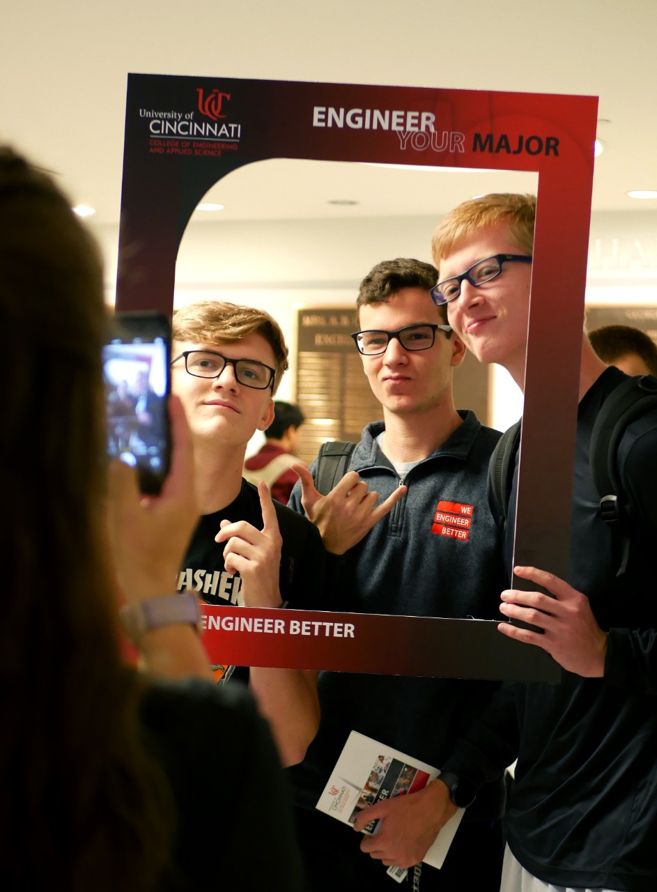 students pose for a picture at event. 