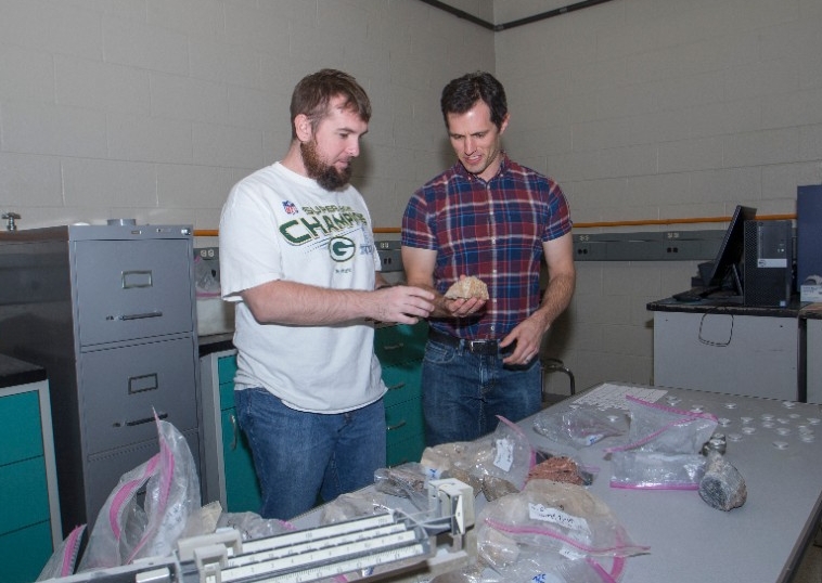 Daniel Sturmer, UC geology professor shown here in his at office and lab at Geo-Phys. UC/ Joseph Fuqua II