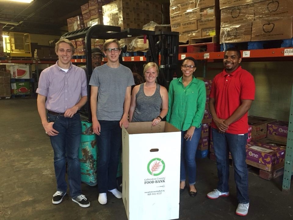 Robinson volunteering at the Galveston Food Bank while on co-op with Marathon Petroleum