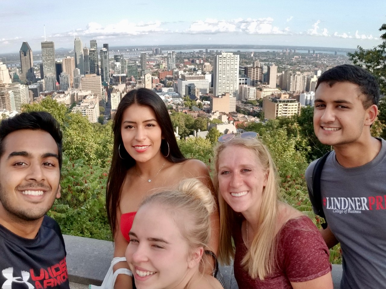 UC students stand in front of downtown Montreal during their visit in 2018.