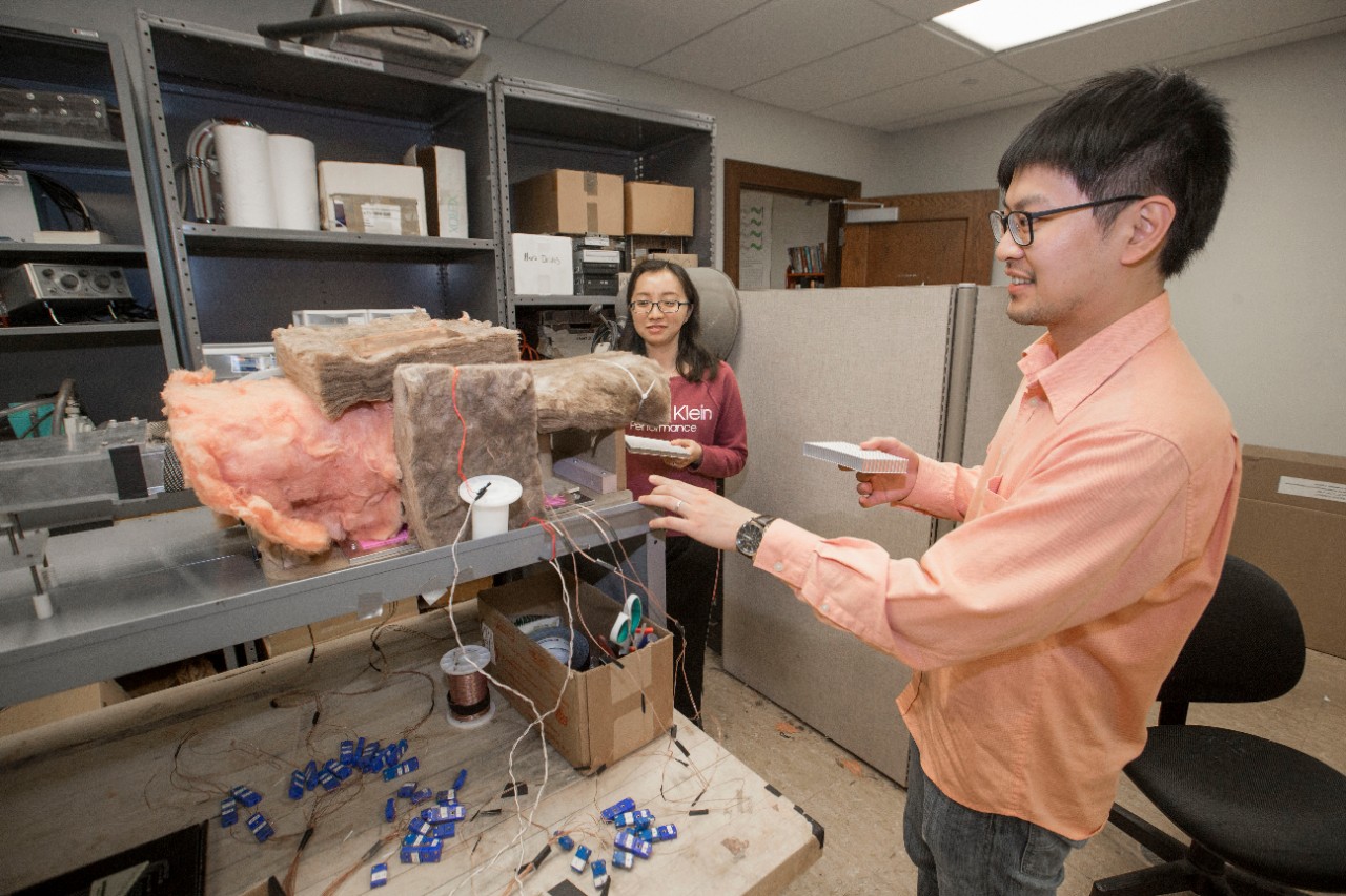 Dr. Milind Jog, PhD, left and Dr. Raj Manglik, PhD UC engineering research partners discussed their ongoing work at Rhodes Halls. UC/Joseph Fuqua II 