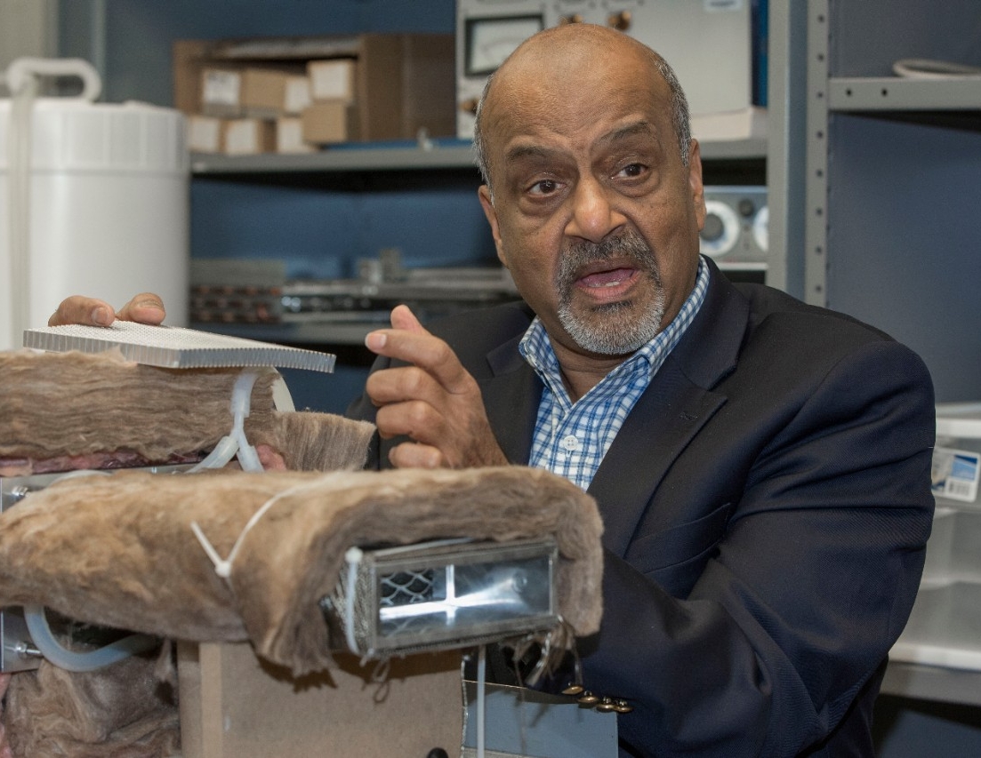 Dr. Raj Manglik, PhD, left and Dr. Milind Jog, PhD UC engineering research partners discussed their ongoing work in their Lab at Rhodes Halls. UC/Joseph Fuqua II 