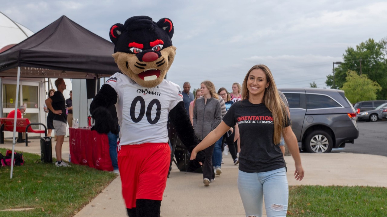 student and Bearcat tour campus