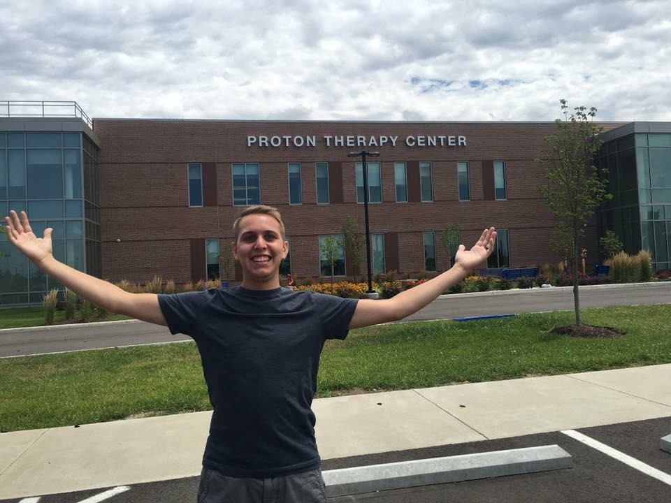 Porter standing outside of the Proton Therapy Center