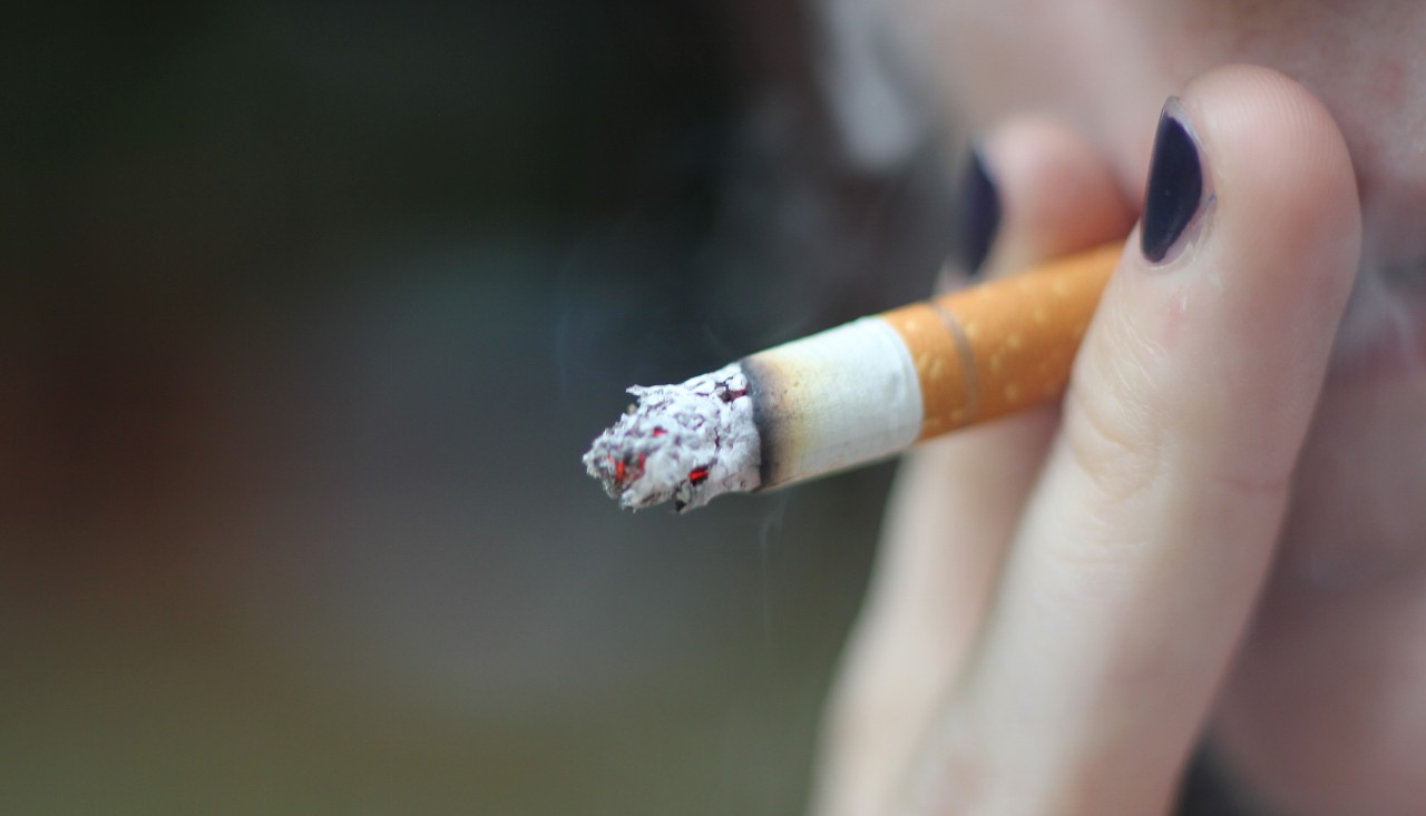 Person smoking a cigarette