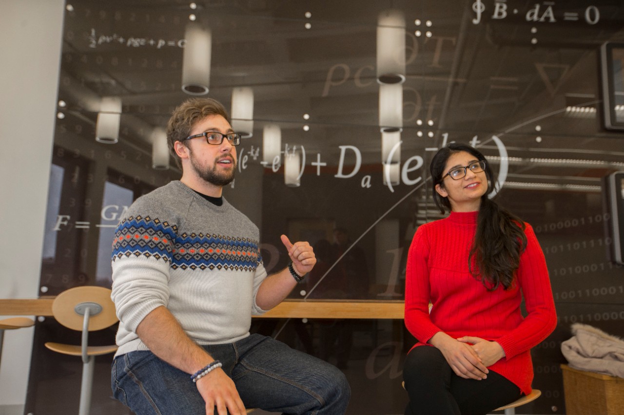 UC students Jacob Tracy, left and Asphota Wasti are master student of UC professor Patrick Ray shown here at ERC and in their office. UC/Joseph Fuqua II